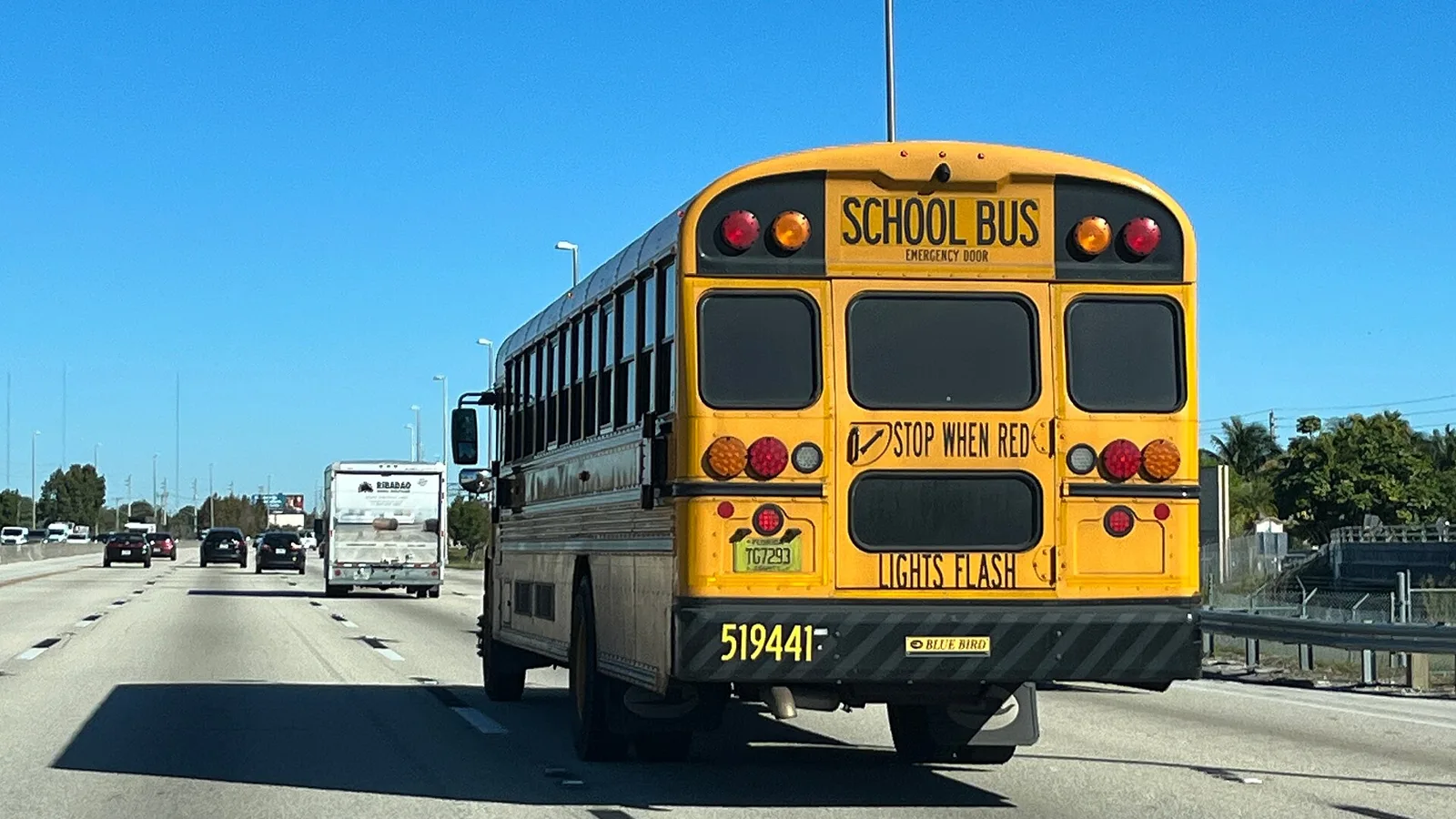 A yellow school bus on Florida's Turnpike in South Florida.
