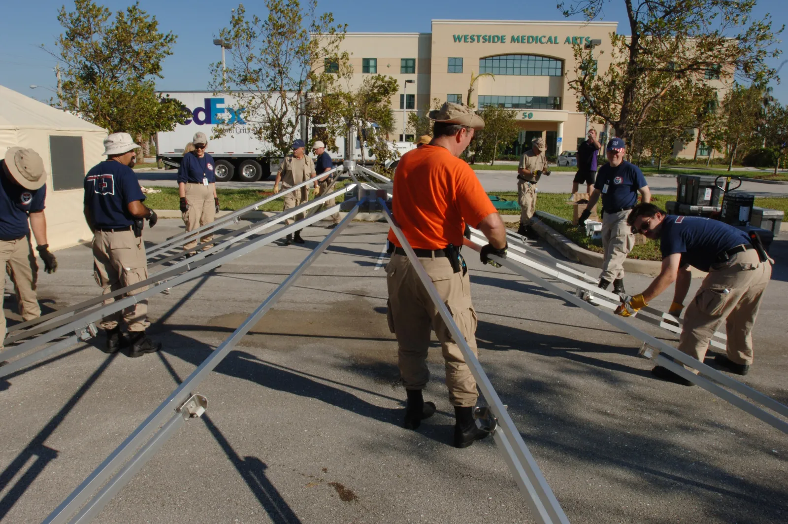 A FEMA medical team sets up tents outside Westside Regional Medical Center in Plantation to handle extra emergency patients after Hurricane Wilma.