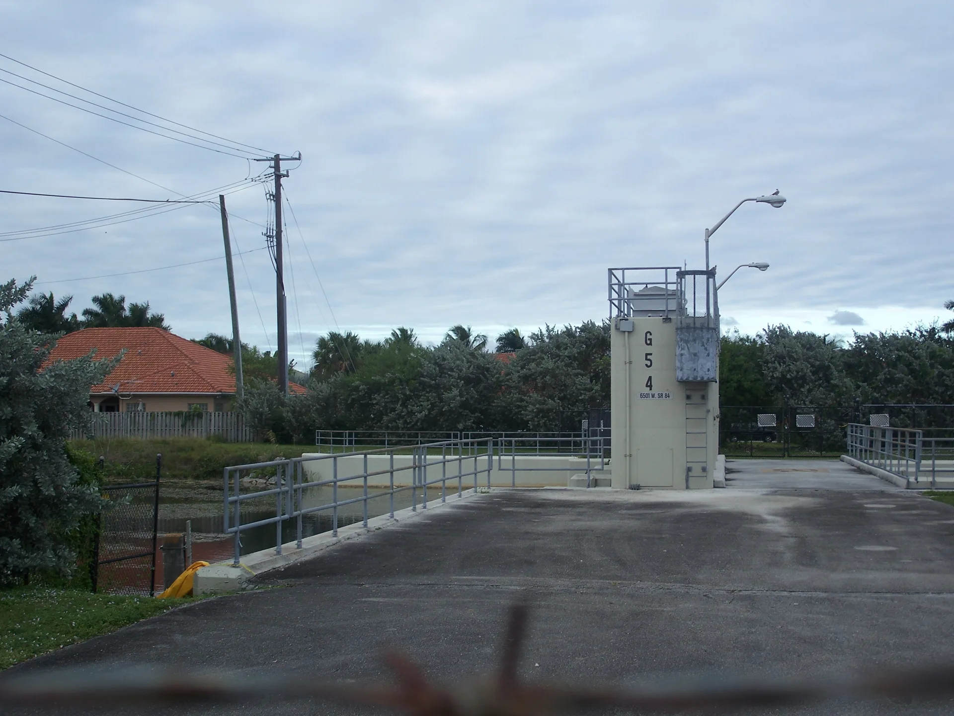 A water control structure on the North New River Canal in Plantation. The canal forms the southern edge of Plantation Acres farther west.