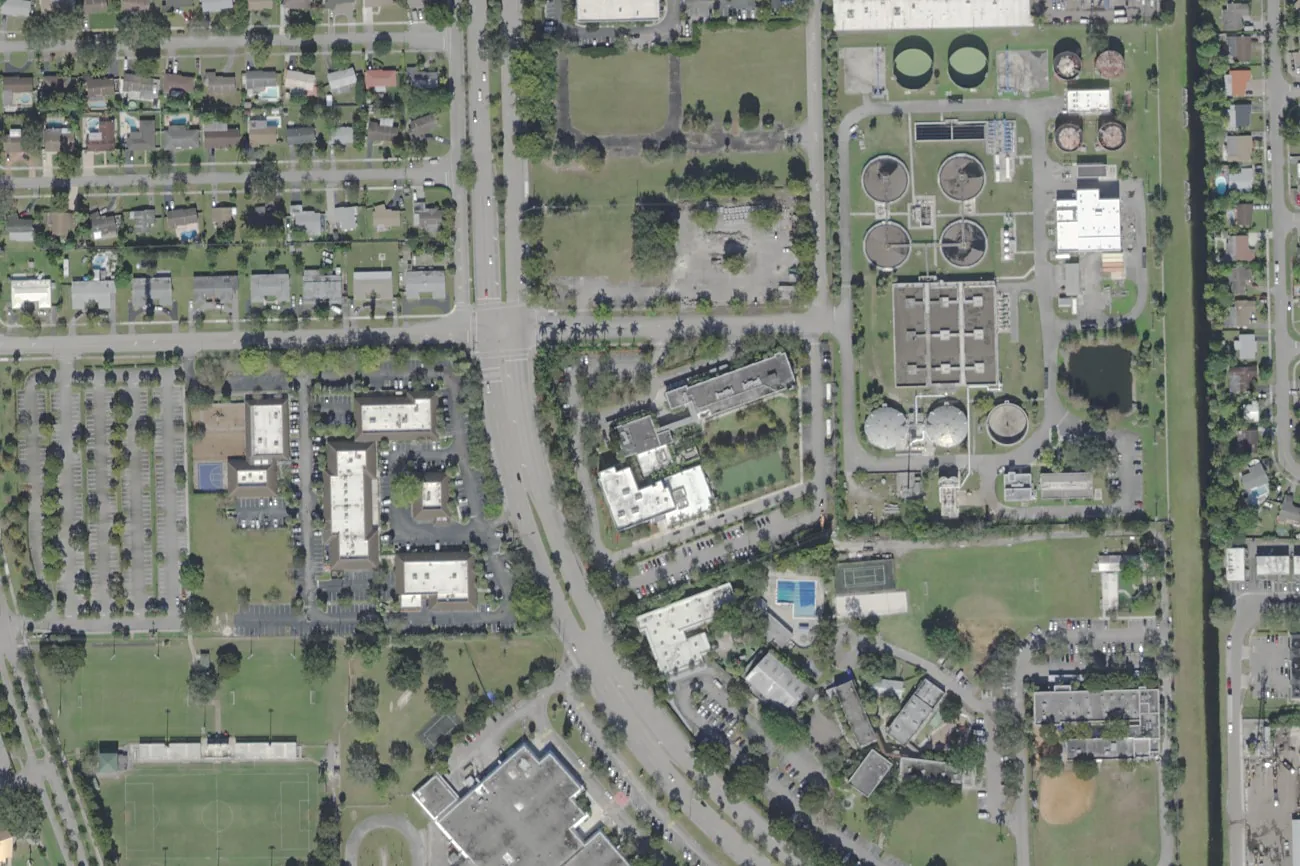Renaissance Charter School at Plantation's campus, center, with its sports field, in central Plantation, seen from the air.