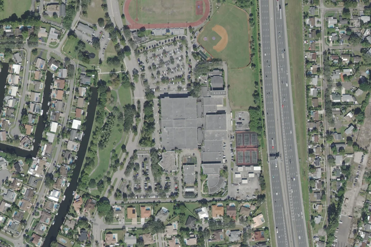 South Plantation High School's campus on Paladin Way in Plantation, beside Florida's Turnpike, seen from the air.