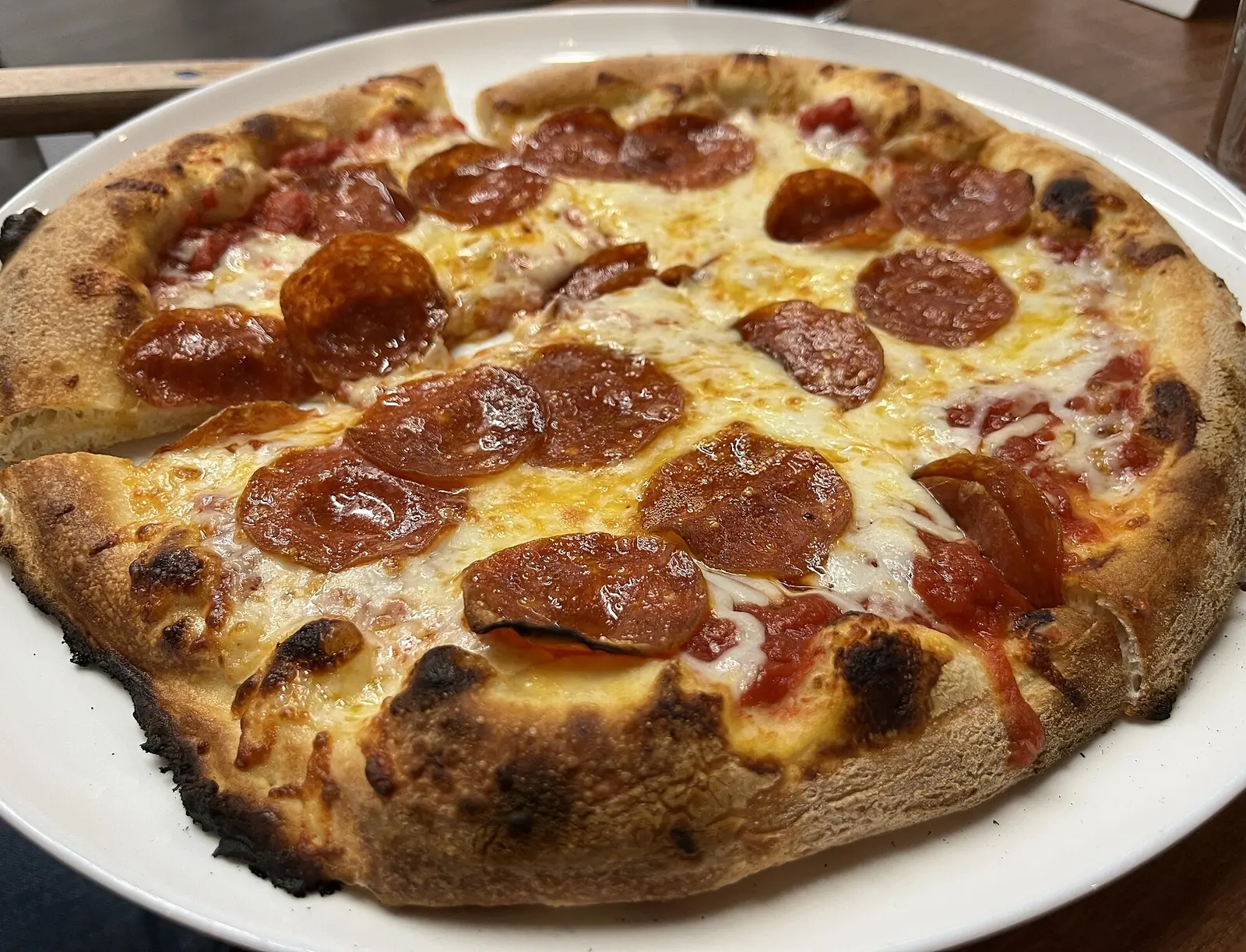 A pepperoni pizza at a pizza bar in Miami.
